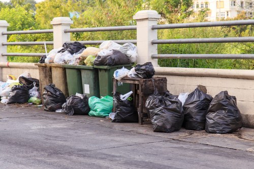 Modern waste removal truck operating in Havering