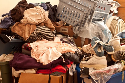 Expert in action during a detailed loft clearance process in Havering